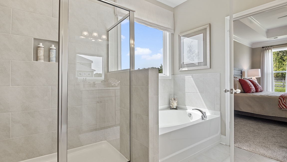 Primary bathroom with double vanity sinks.