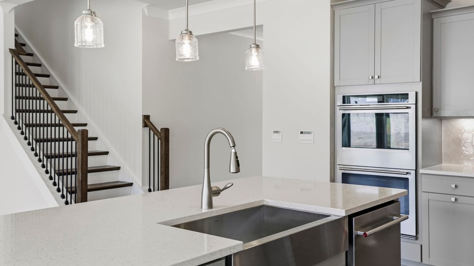 Kitchen with island and cabinets.