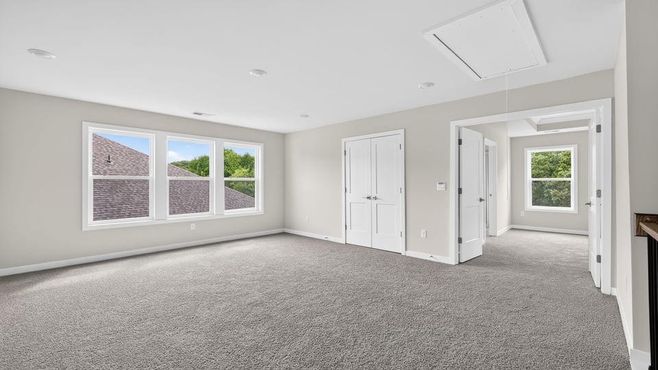 Loft area with windows.