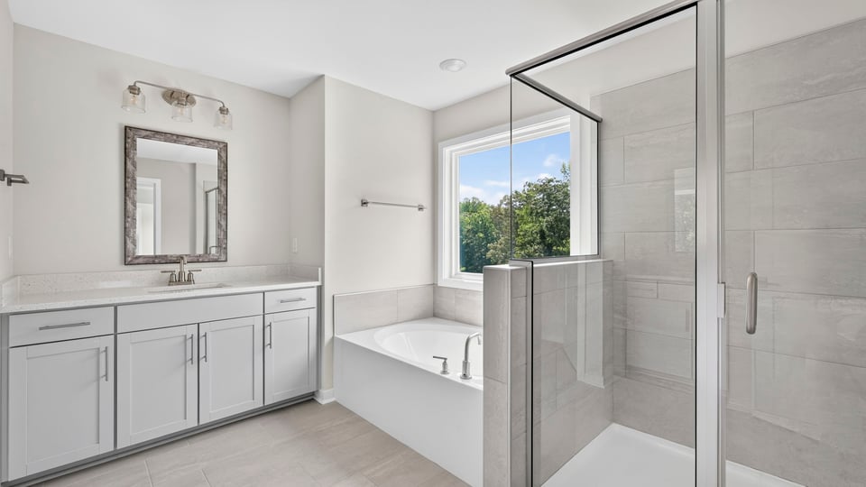 Primary bathroom with double vanity sinks.