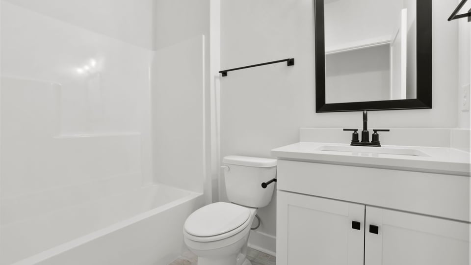 Bathroom with single vanity sink.