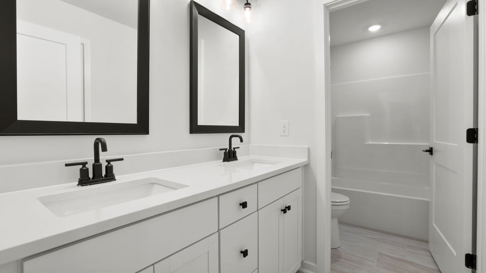 Bathroom with double vanity sink.