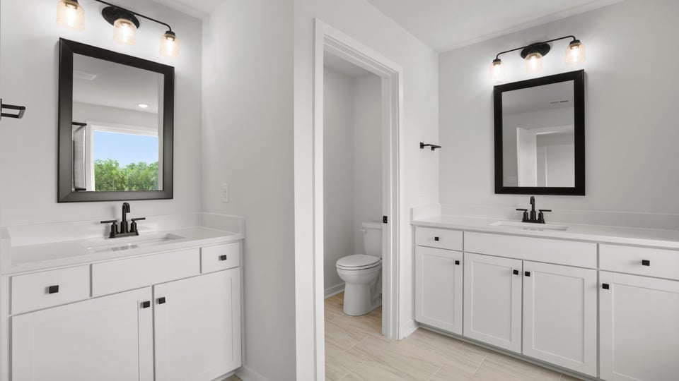 Bathroom with double vanity sink.