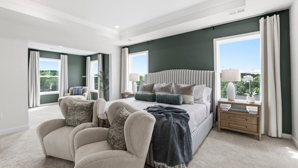 Bedroom with carpet and window.