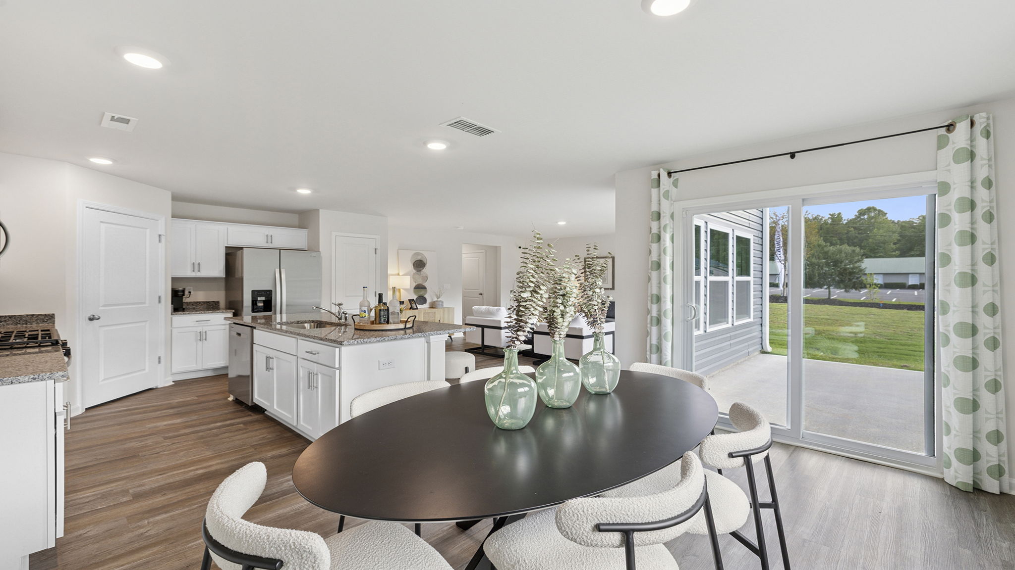 Kitchen with island and cabinets.