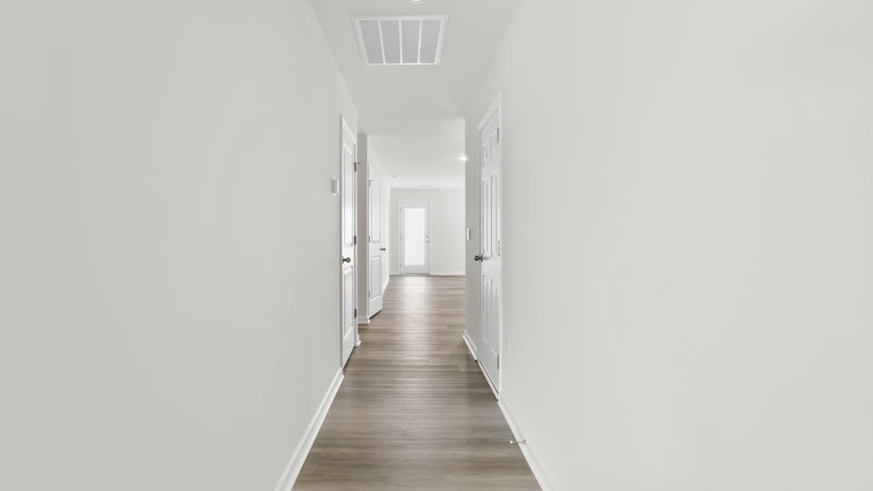 View of the hallway looking toward the living area.