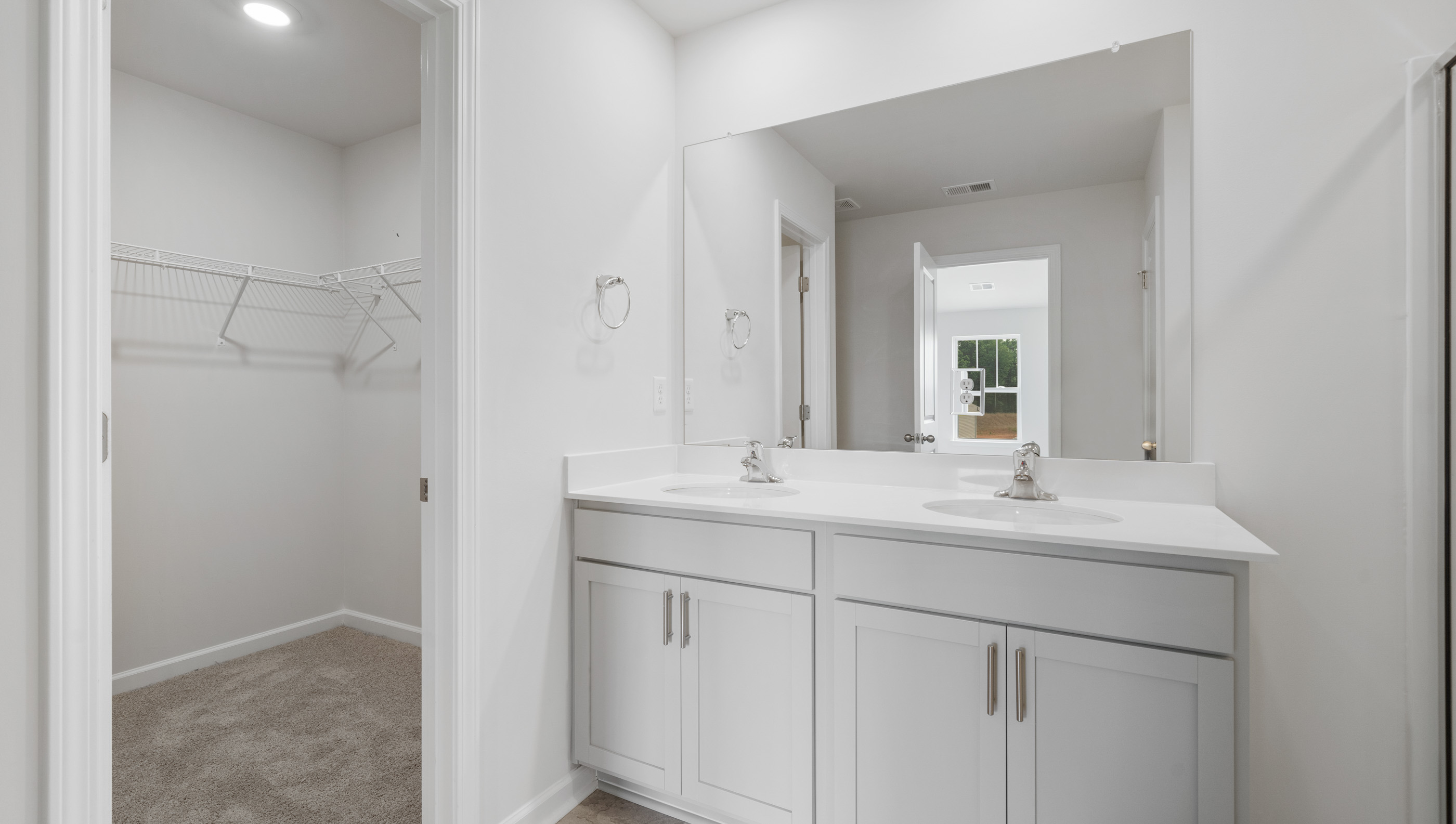 Primary bathroom with vanity sink.