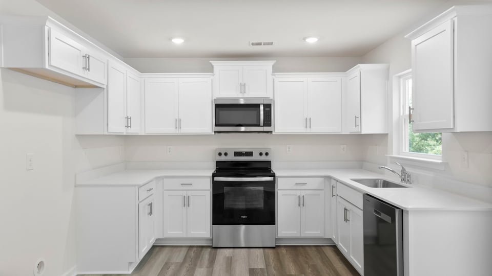 Kitchen with stainless steel appliances.