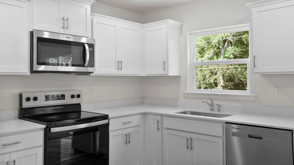 Kitchen with stainless steel appliances.