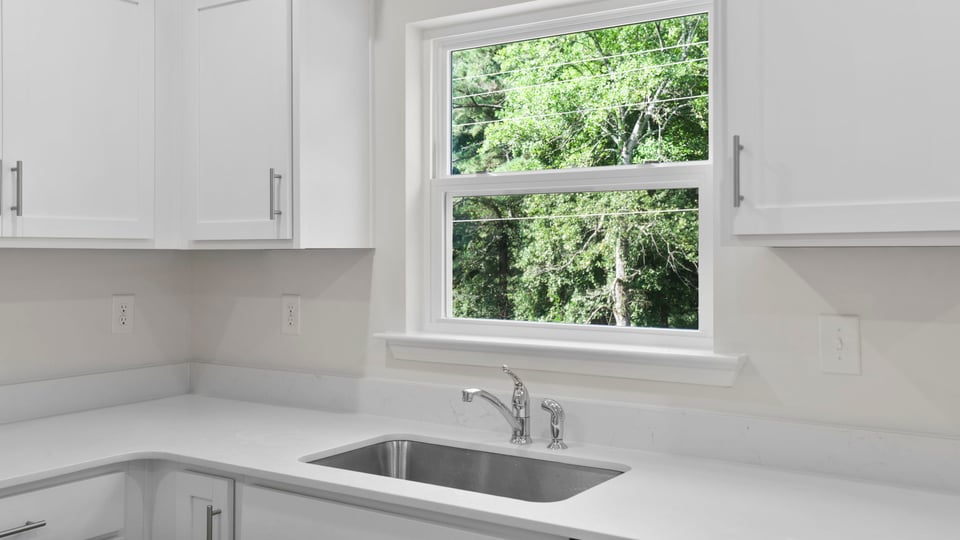 Kitchen with stainless steel appliances.