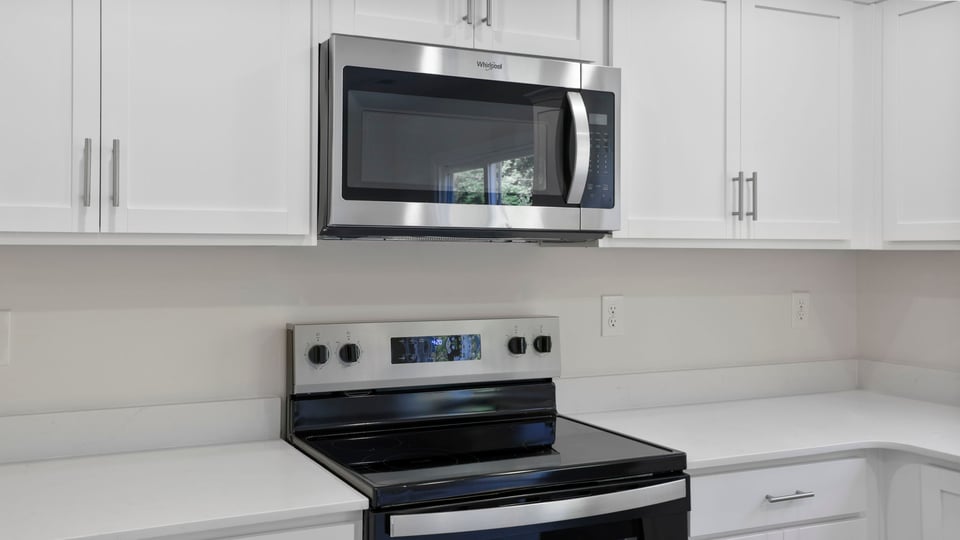 Kitchen with stainless steel appliances.