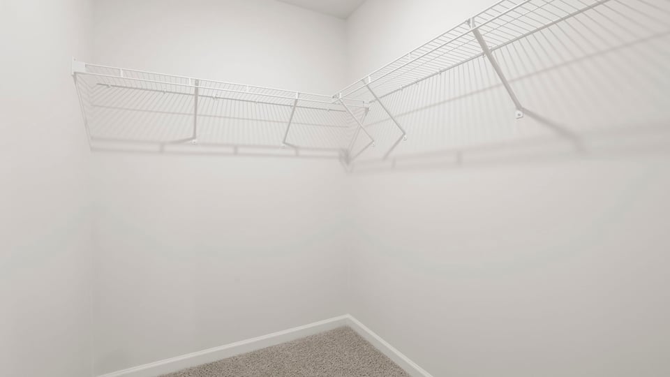 Closet with hanging storage racks.