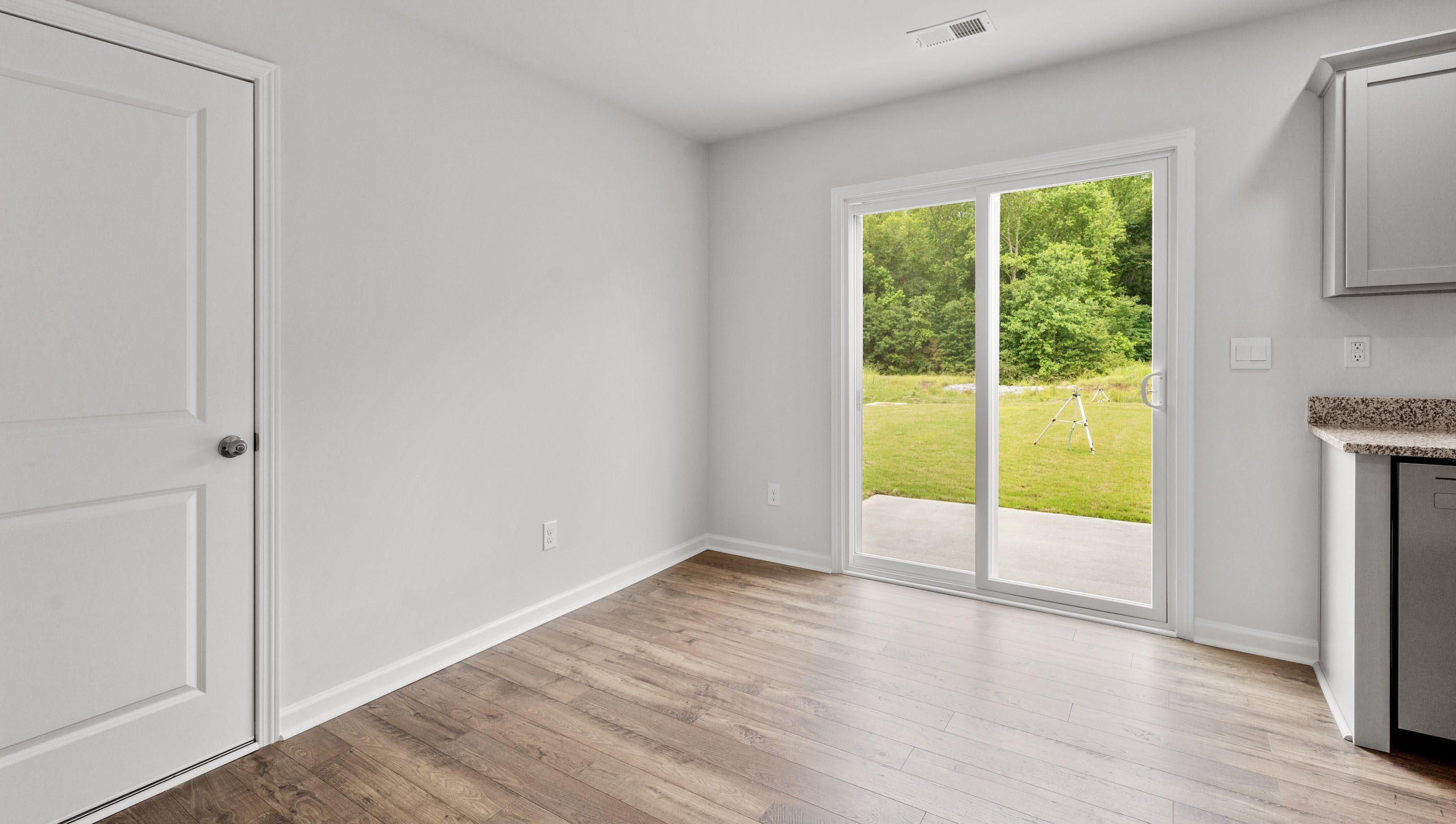 Living area with fireplace and window.