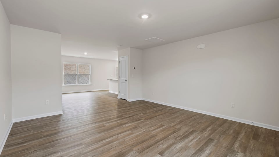 View of the family room into the dining room.
