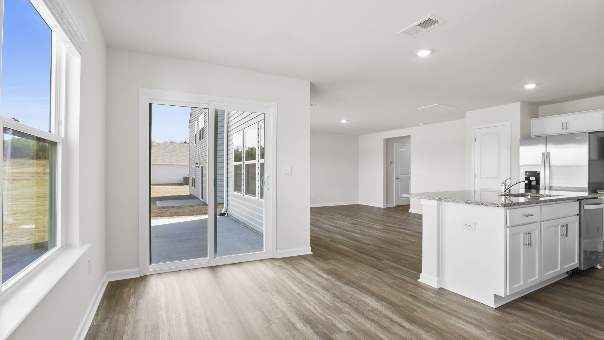View of dining area with the door to the patio.