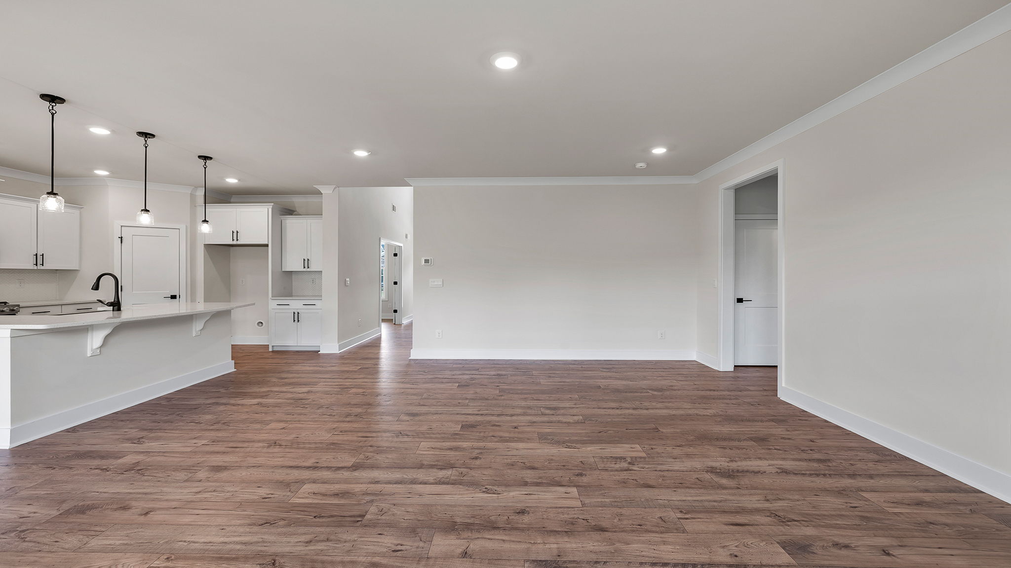 Living room with fireplace and window.