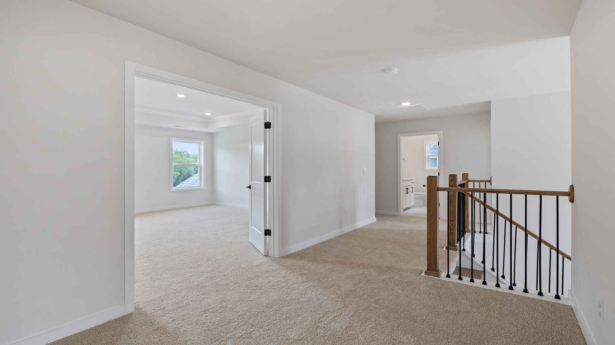 Upstairs landing with carpet.