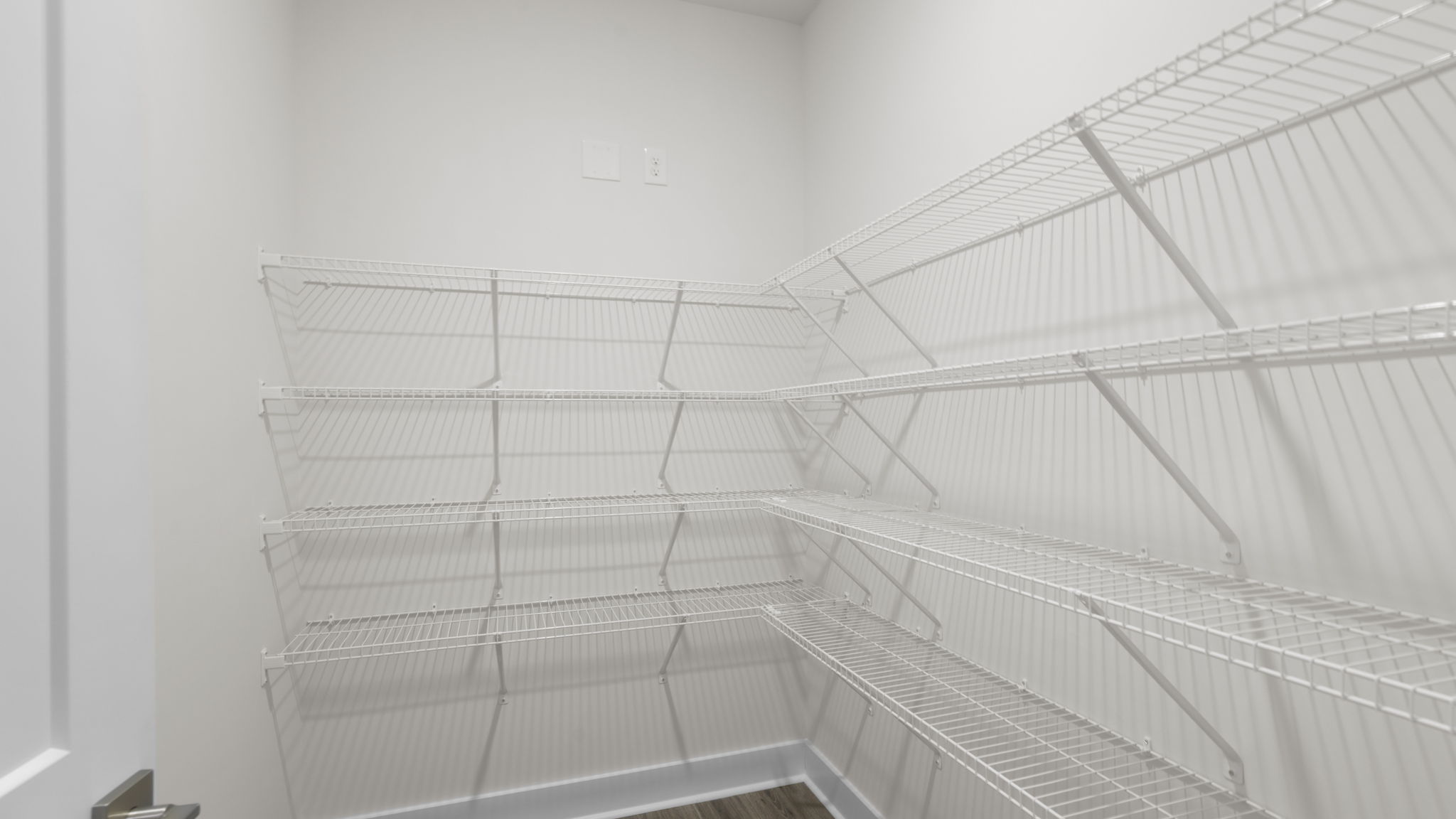 Primary bedroom walk-in closet.