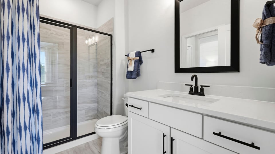 Bathroom with vanity sink.