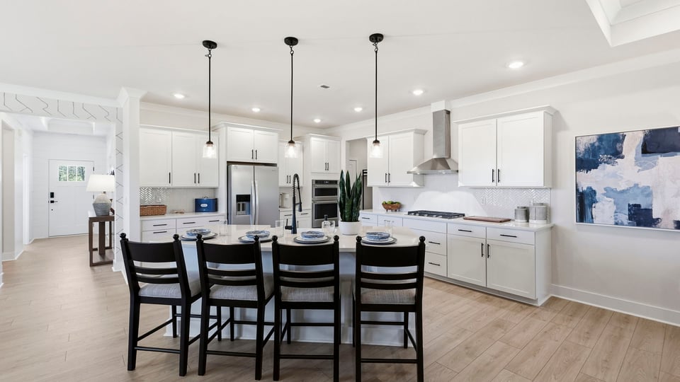 Kitchen with island and cabinets.