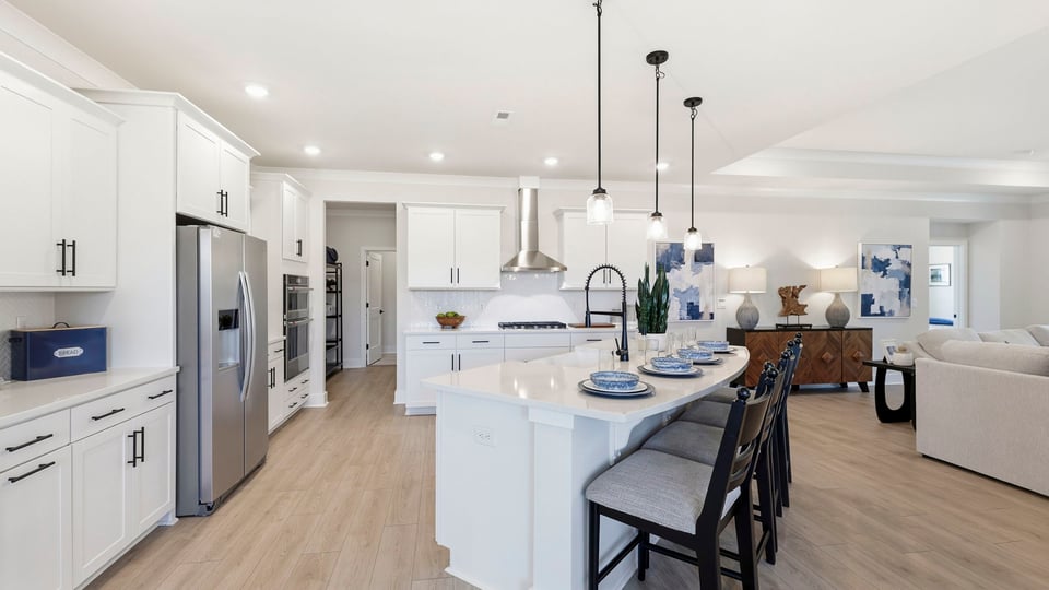 Kitchen with island and cabinets.