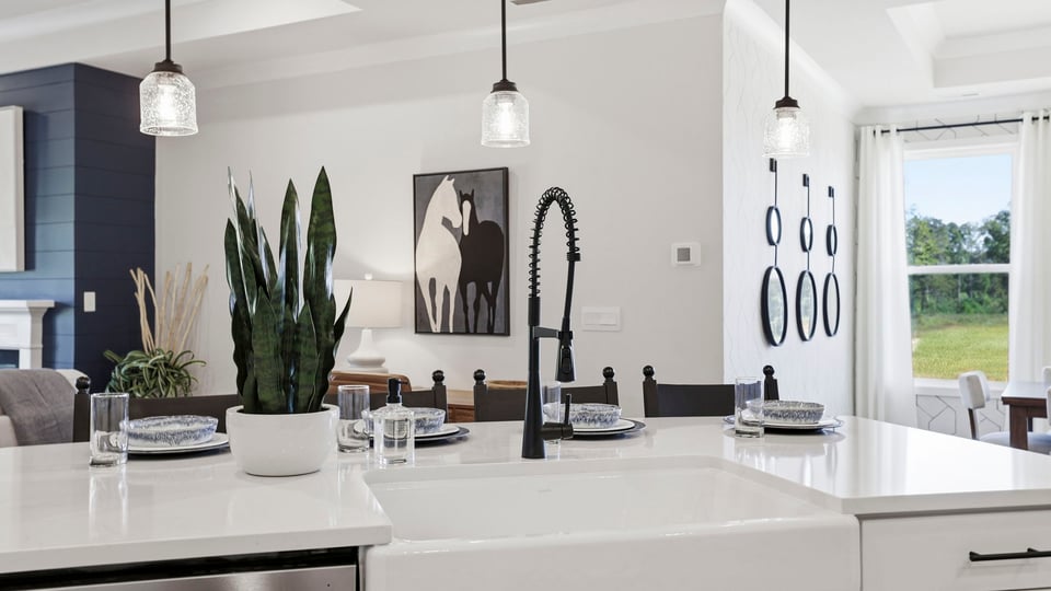 Kitchen with island and cabinets.