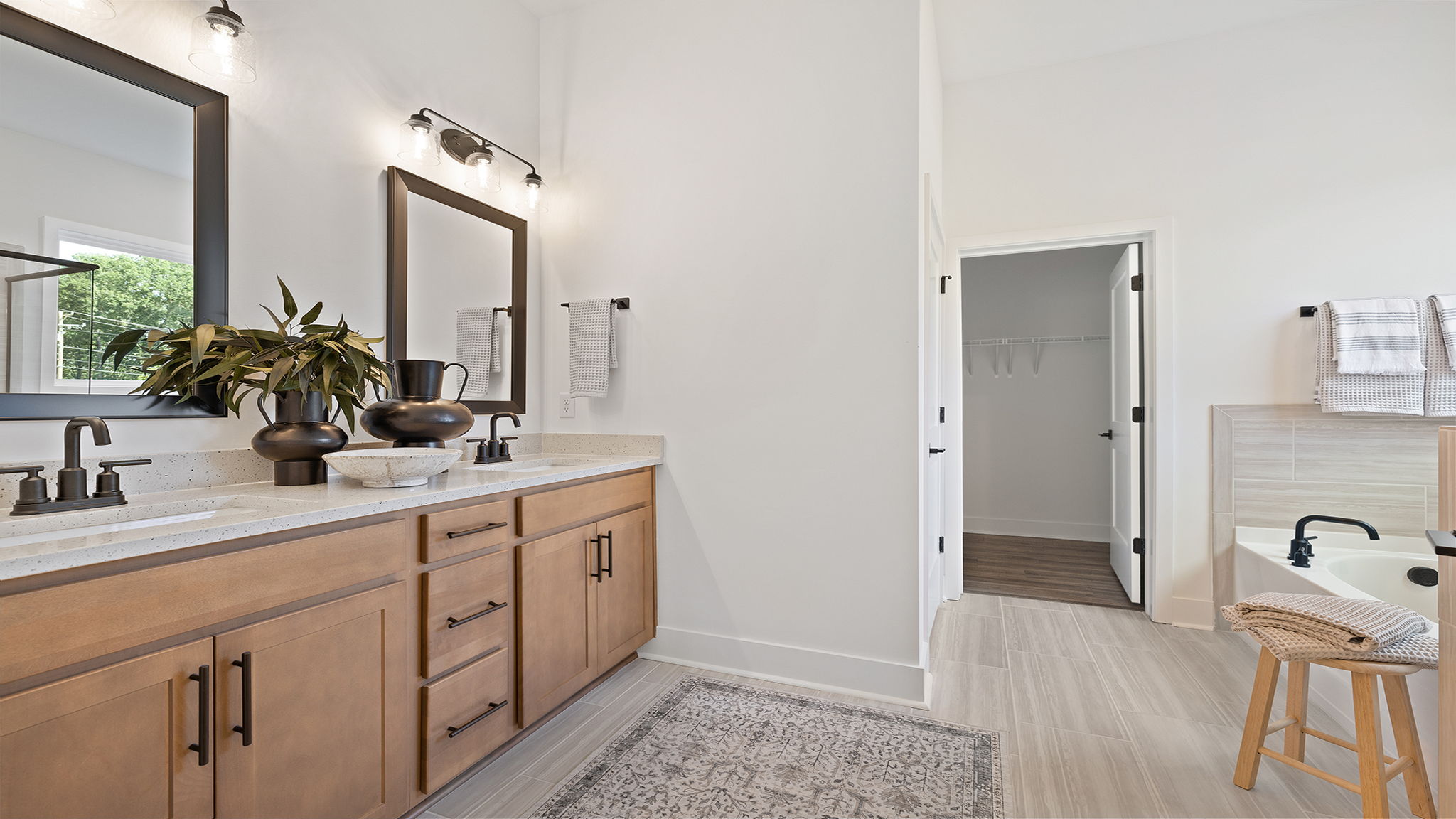 Primary bathroom with double vanity sinks.