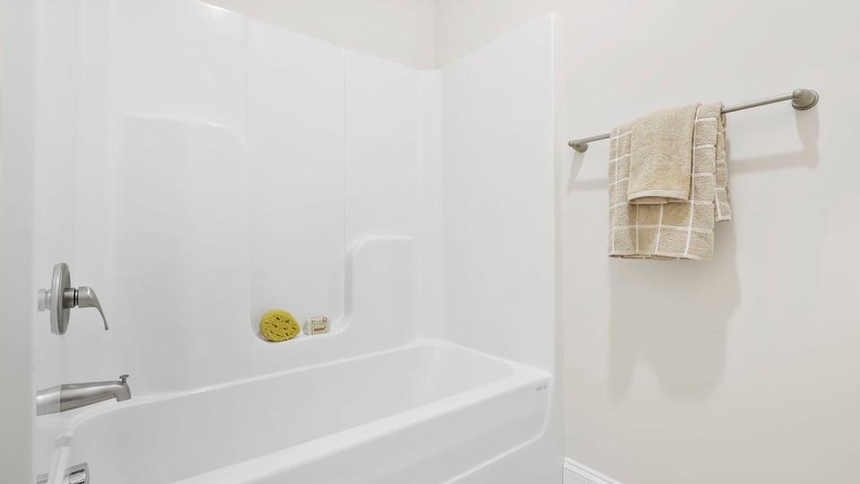 Primary bathroom with double vanity sinks.