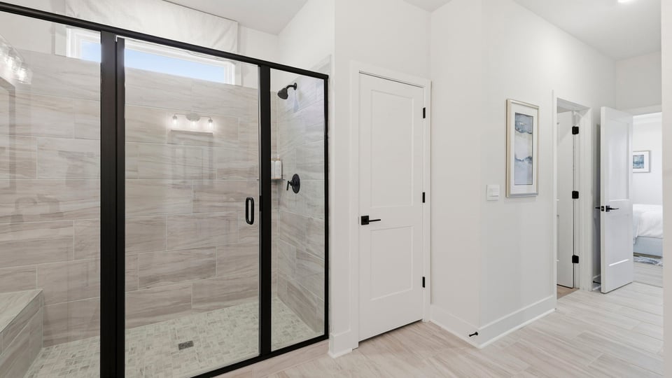 Primary bathroom with double vanity sinks.