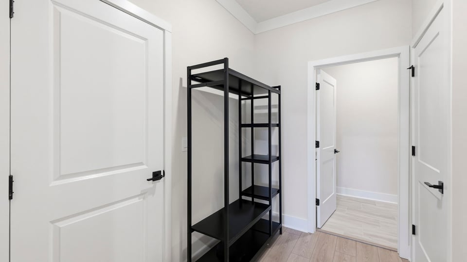 Hallway with storage.