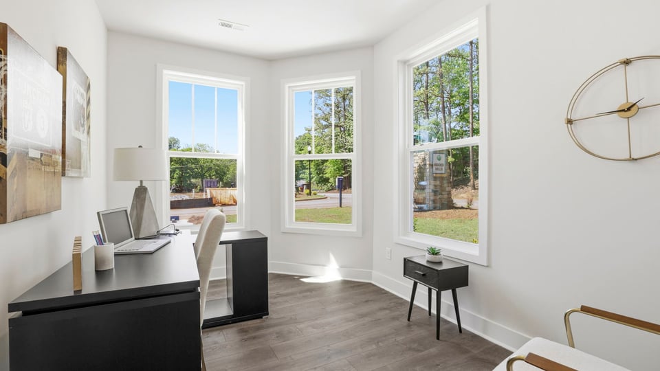 Flex area at front of home with windows.