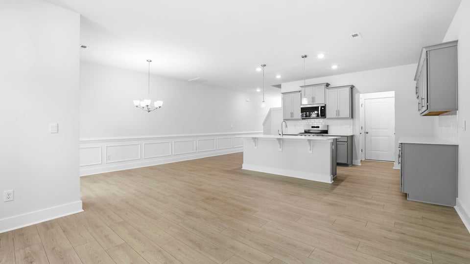 Family room with windows.