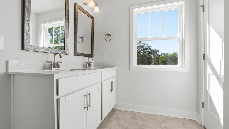 Bathroom with double vanity sink.