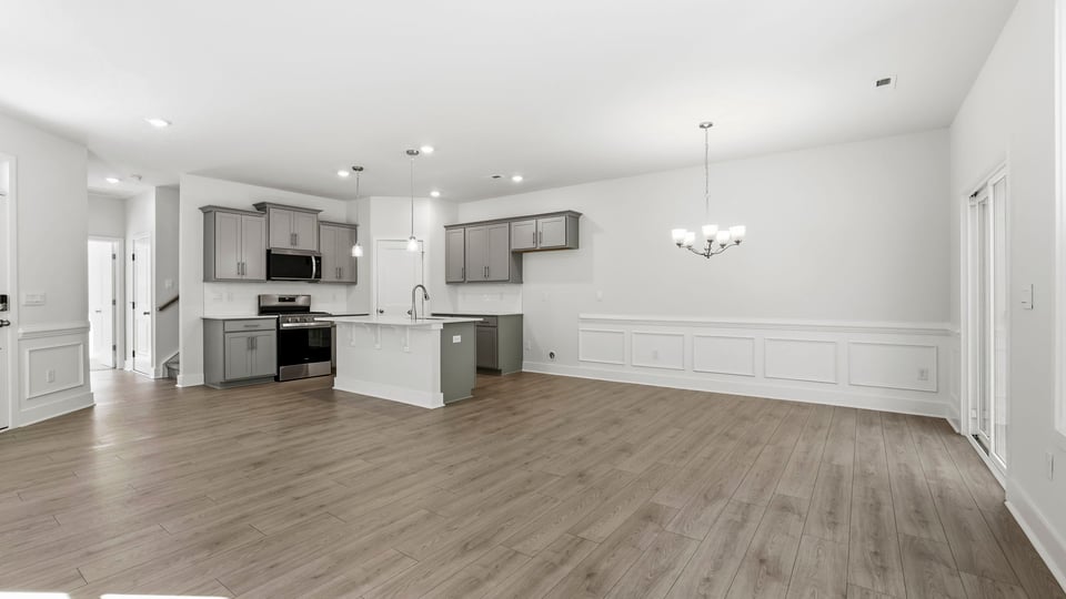 Family room with view of kitchen.