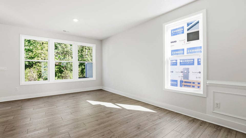 Family room with windows.