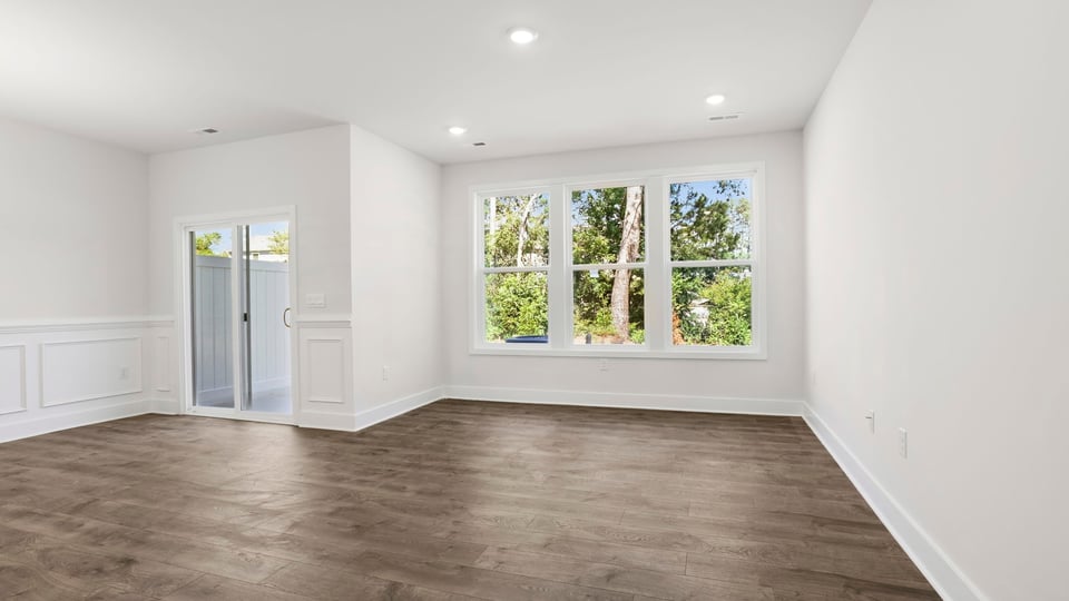 Family room with windows.