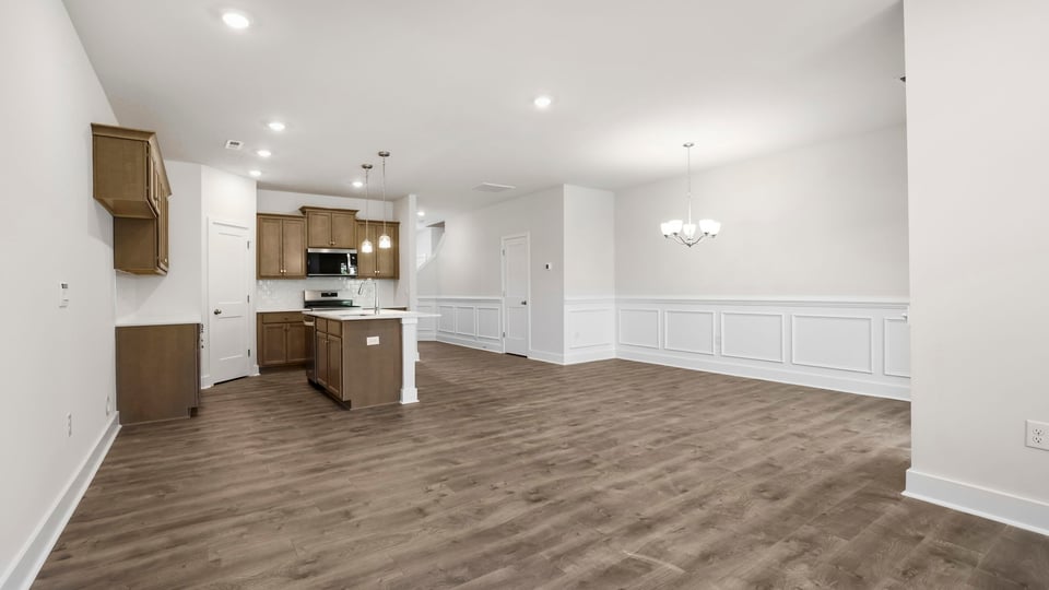 Family room with view of kitchen.