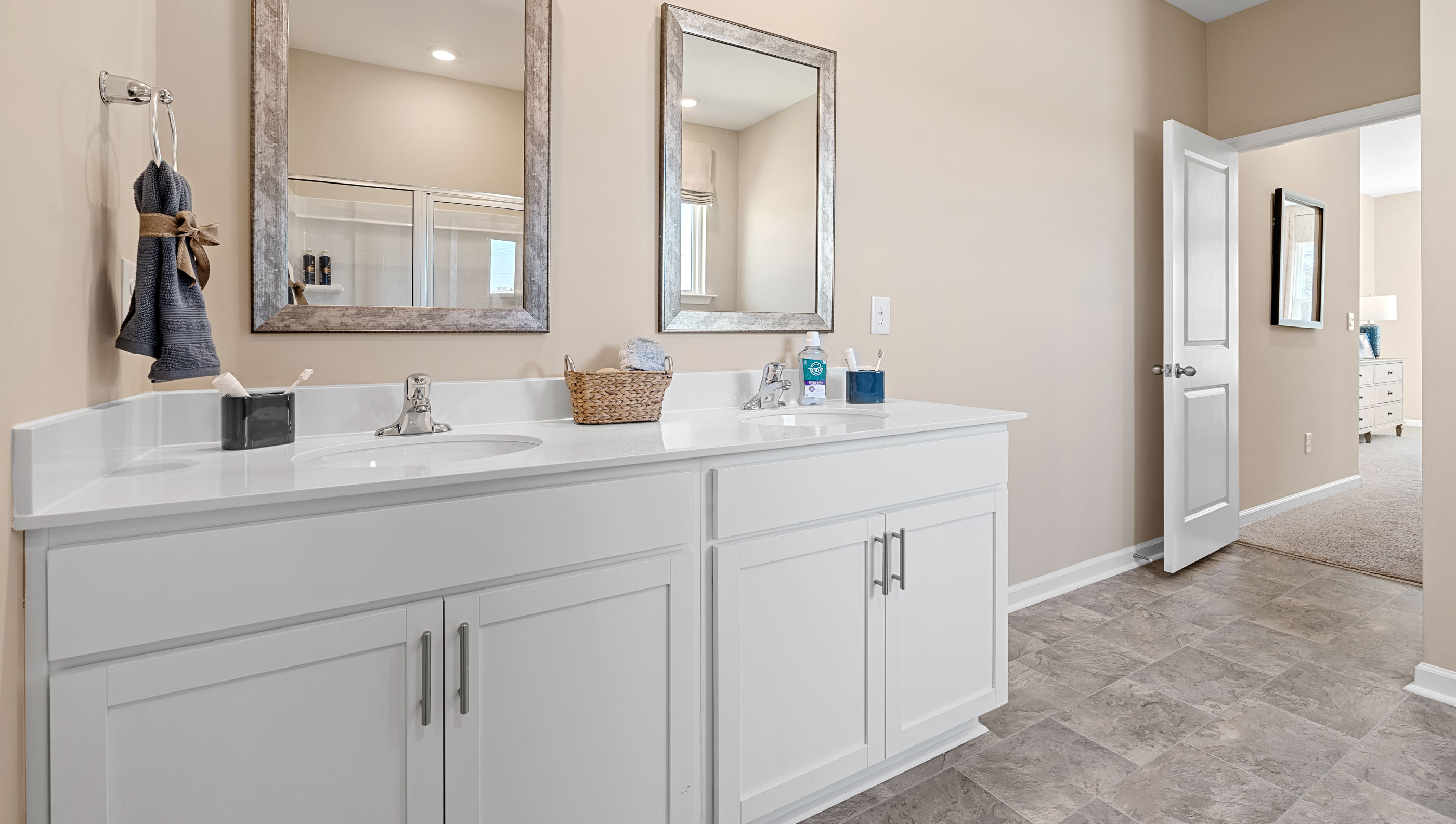 Primary bathroom with double vanity sinks.