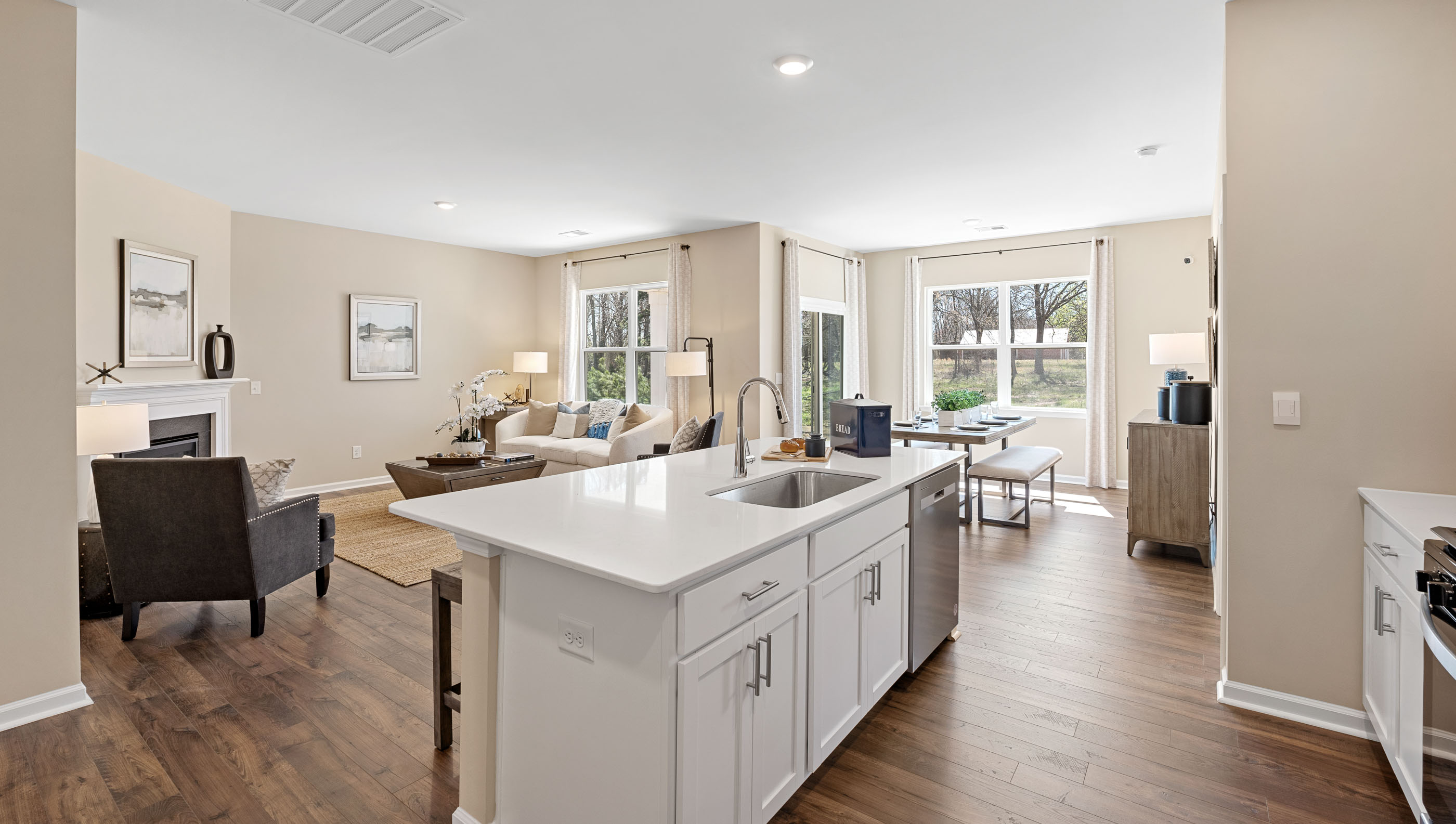 Kitchen with island and cabinets.