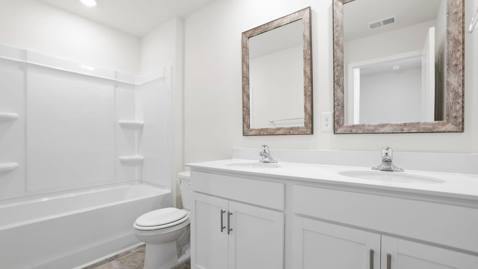 Bathroom with double vanity sinks.