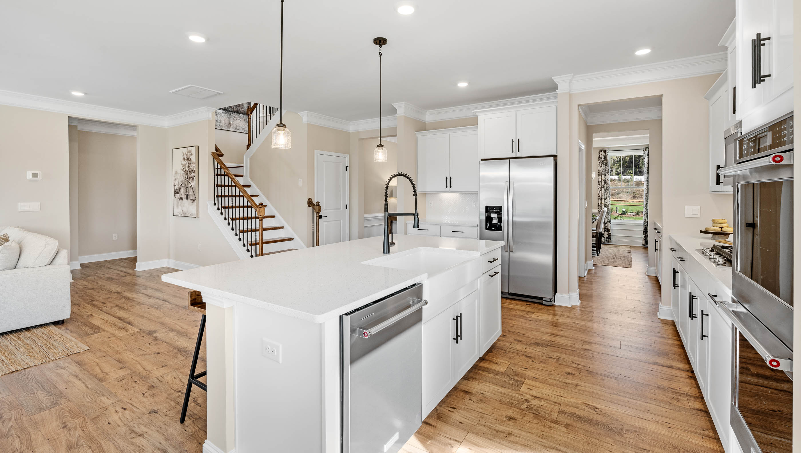 Kitchen with island and cabinets.