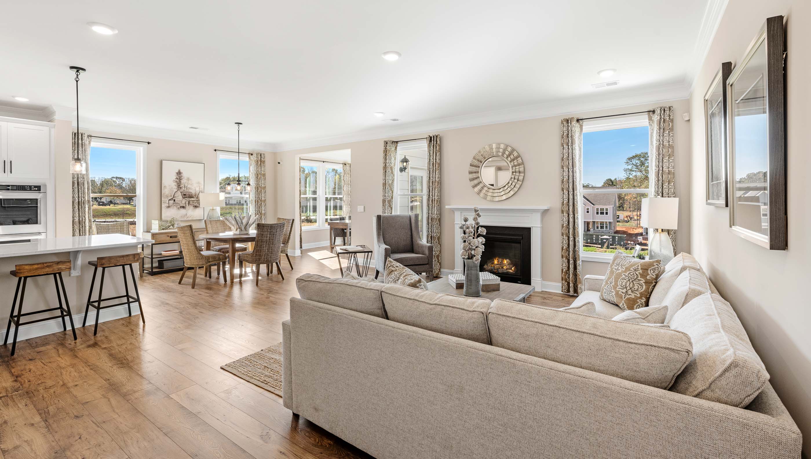 Living area with windows and fireplace.