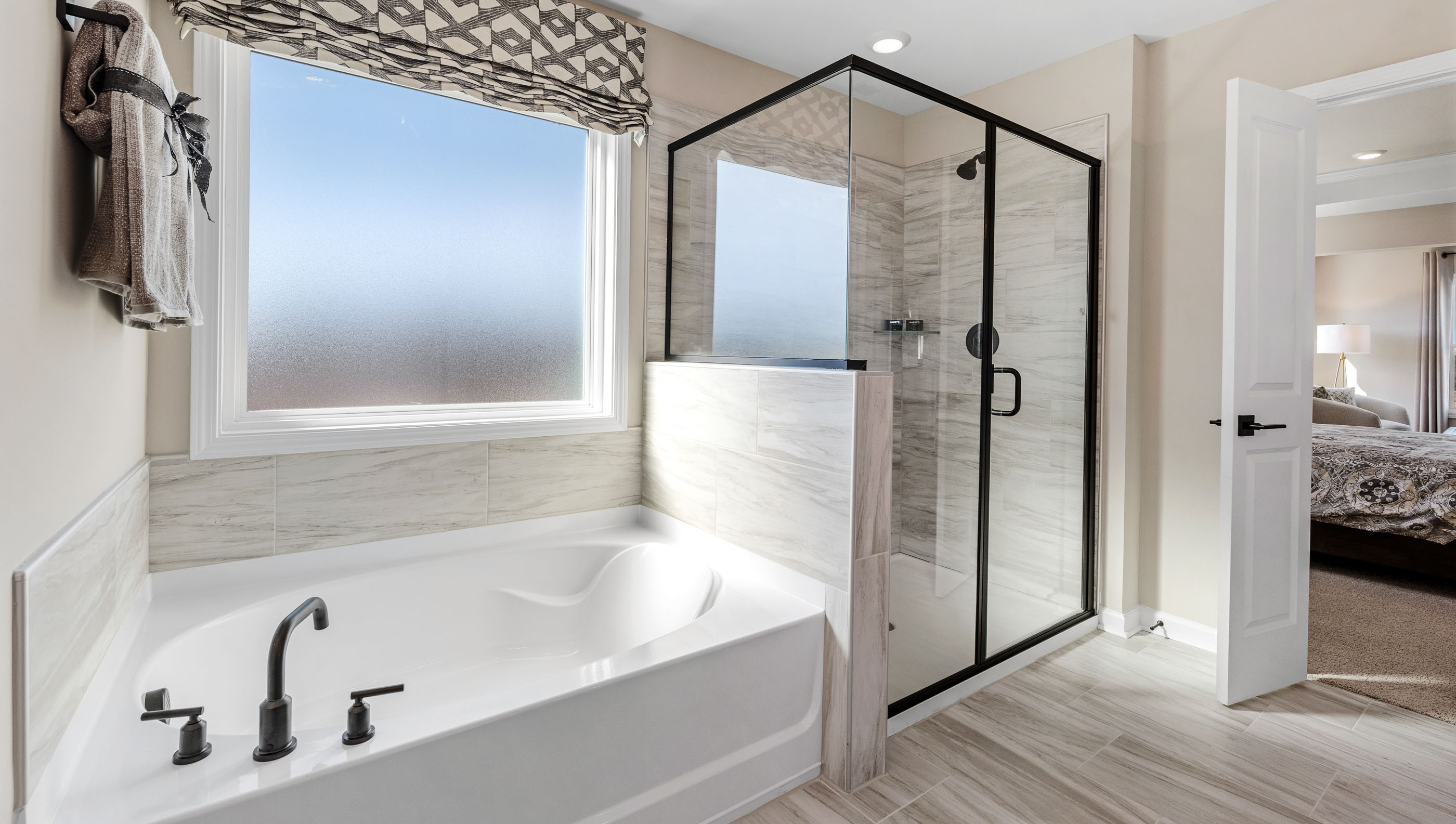 Primary bathroom with double vanity sinks.