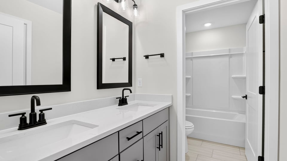 Bathroom with double vanity sinks.