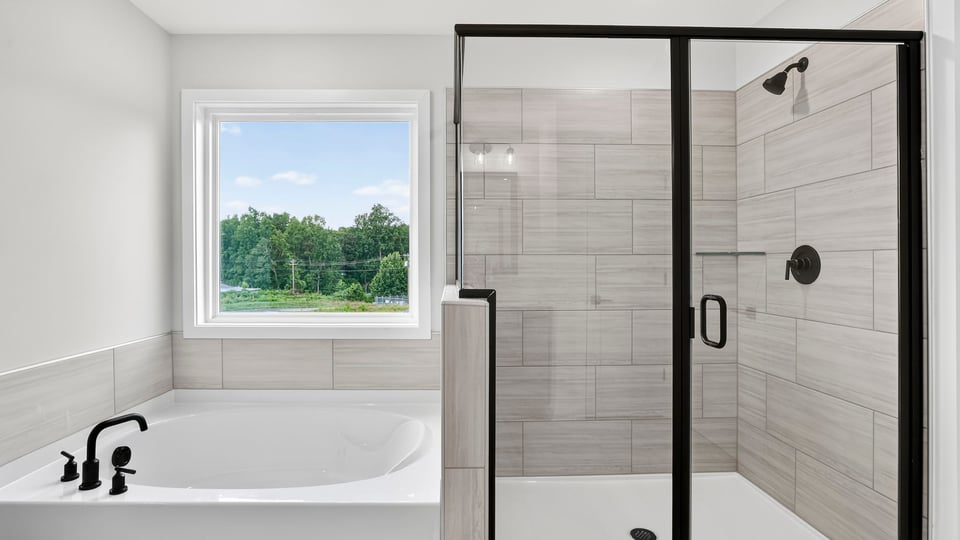 Primary bathroom with double vanity sinks.