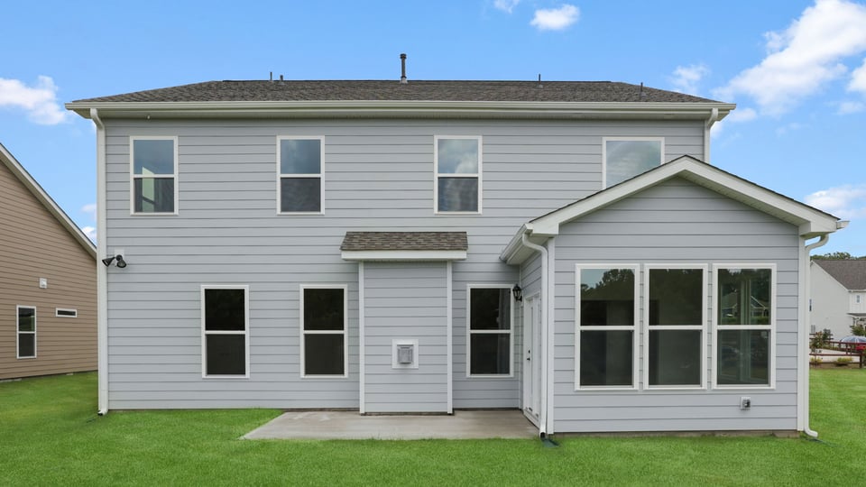 Back exterior with large backyards.