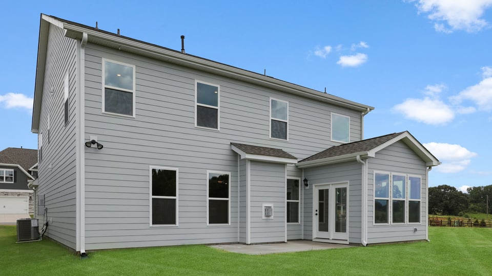 Back exterior with large backyards.
