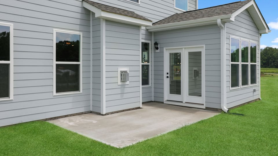 Back exterior with large backyards.