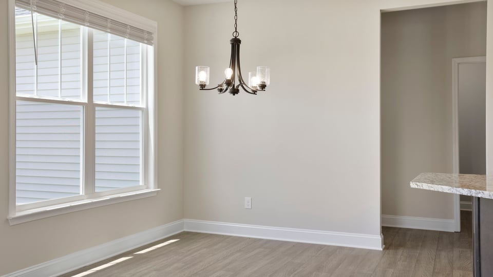 Kitchen with view of living room.
