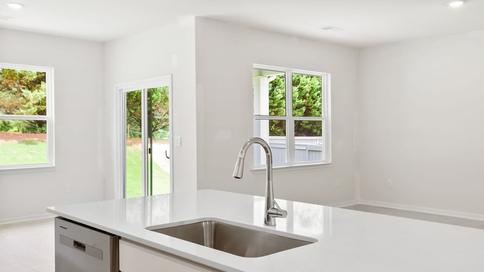 Kitchen with stainless steel appliances.